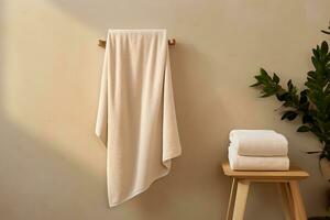 Bath towel hanging on the wall, chair with towel. AI generated photo