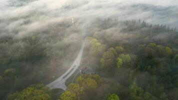 Aerial view of a road in the fog video