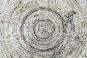 closeup of a spiral shaped texture on a wooden panel - Old wooden board background photo