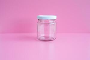 1 empty jar, white lid, with a pink scene, close up. photo