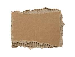 Brown Cardboard paper piece isolated on white background photo