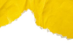 Yellow ripped paper torn edges strips isolated on white background photo