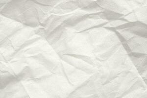 Abstract white crumpled and creased recycle paper texture background photo