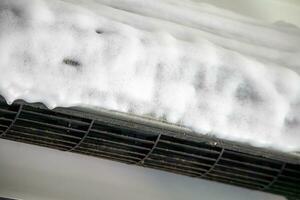 air conditioner cleaning with spray foam cleaner photo