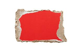 piece of red cardboard paper tear isolated on white background photo
