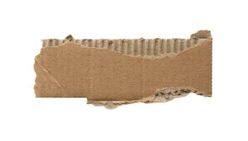 Brown Cardboard paper piece isolated on white background photo