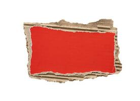 piece of red cardboard paper tear isolated on white background photo