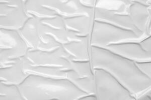 white crumpled and creased plastic bag texture background photo