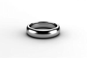 a silver wedding ring on a white background photo