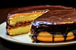 a boston cream pie with chocolate icing on a plate AI Generated photo