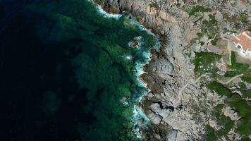 Aerial revealing view of roky sea coast in Sardinia video