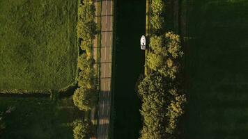 aerial view of a road and a canal in the countryside video