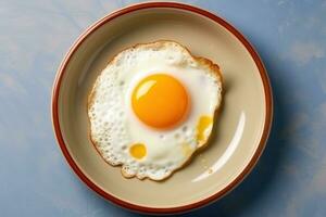 an egg on a plate on a vintage blue background AI Generated photo