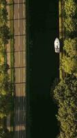 aerial view of a road and a canal in the countryside video