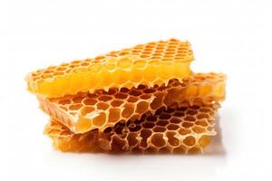 a stack of honeycombs on a white background photo