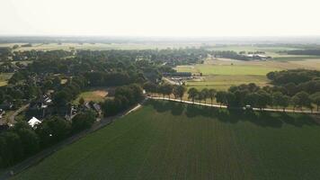 Aerial view of a rural area with houses and fields video