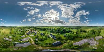 360 hdri panorama view over abandoned eco village in middle of woods in equirectangular spherical projection. for VR AR content photo