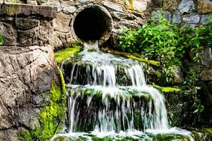 Photography on theme beautiful fall water from garden waterfall photo