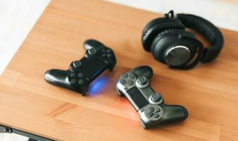 Gamepads on the table photo