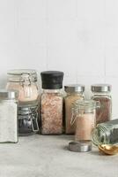Jars with assorted speciality salt photo