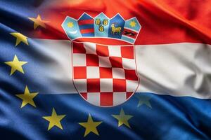 Flags of Croatia and EU blowing in the wind photo