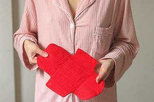 close-up of female hands with reusable cotton pads without waste photo