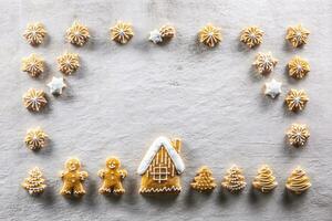 Home-baked gingerbreads arranged in a fairytale Christmas atmosphere. photo
