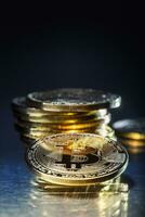 Bitcoin. Golden and silver bitcoins - virtual cryptocurrency photo