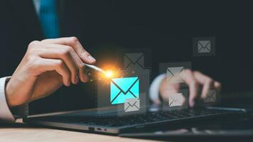 Email marketing and newsletter concept ,Digital communication with email messages ,Sending and receiving messages online with email icon ,notifications ,information management photo