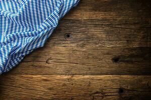 Oktoberfest. The blue checkered tablecloth or napkin typical of the Munich Beer Festival in the German Oktoberfest. Free space for your text product or information photo