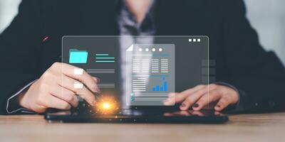 Accountant showing office document auditing concept ,plan review process and assess correctness ,Management of important document storage of organization ,document system ,accountant Audit documents photo