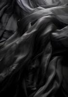 Black transparent background of flowing fabric, in the style of monochrome colors. art photo