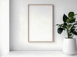 Blank picture frame mockup on white wall photo