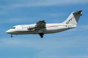 CityJet Avro RJ85 EI-RJY passenger plane landing at Hamburg Airport photo