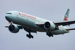 Air Canada passenger plane at airport. Schedule flight travel. Aviation and aircraft. Air transport. Global international transportation. Fly and flying. photo