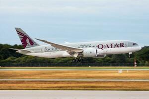 Qatar Airways passenger plane at airport. Schedule flight travel. Aviation and aircraft. Air transport. Global international transportation. Fly and flying. photo