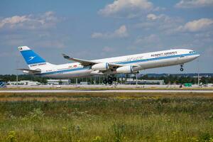 Kuwait Airways passenger plane at airport. Schedule flight travel. Aviation and aircraft. Air transport. Global international transportation. Fly and flying. photo