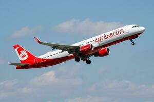 Air Berlin passenger plane at airport. Schedule flight travel. Aviation and aircraft. Air transport. Global international transportation. Fly and flying. photo