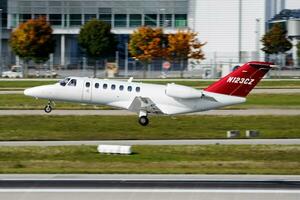 Civilian plane at airport. Business jet and aircraft. Commercial and general aviation. Aviation industry. Fly and flying. photo