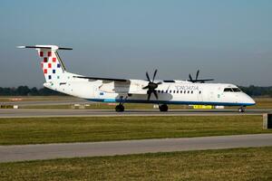 Croatia Airlines passenger plane at airport. Schedule flight travel. Aviation and aircraft. Air transport. Global international transportation. Fly and flying. photo