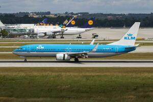 KLM Royal Dutch Airlines Boeing 737-800 PH-BXB passenger plane arrival and landing at Munich Airport photo