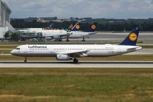 Lufthansa Airbus A321 D-AIDF passenger plane departure and take off at Munich Airport photo