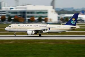 Saudia Saudi Arabian Airlines passenger plane at airport. Schedule flight travel. Aviation and aircraft. Air transport. Global international transportation. Fly and flying. photo