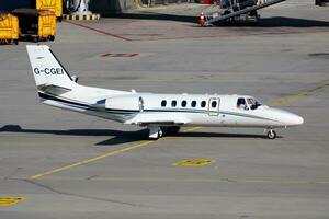 Civilian plane at airport. Business jet and aircraft. Commercial and general aviation. Aviation industry. Fly and flying. photo