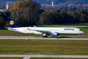 Lufthansa passenger plane at airport. Schedule flight travel. Aviation and aircraft. Air transport. Global international transportation. Fly and flying. photo