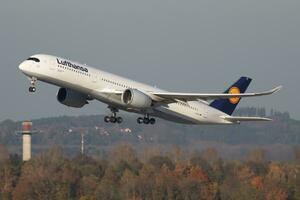 Lufthansa Airbus A350-900 D-AIXC passenger plane departure at Munich Airport photo