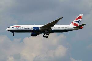 British Airways Boeing 777-200 G-ZZZB passenger plane landing at London Heathrow Airport photo