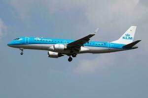 KLM Embraer 190 PH-EZV passenger plane landing at London Heathrow Airport photo