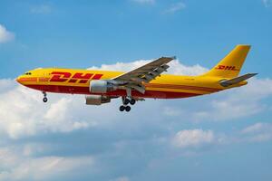 DHL Aviation Airbus A300 D-AEAA cargo plane landing at London Heathrow Airport photo