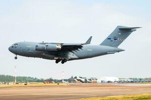 NATO Heavy Airlift Wing HAW SAC Boeing C-17A Globemaster 02 transport plane arrival and landing for RIAT Royal International Air Tattoo 2018 airshow photo